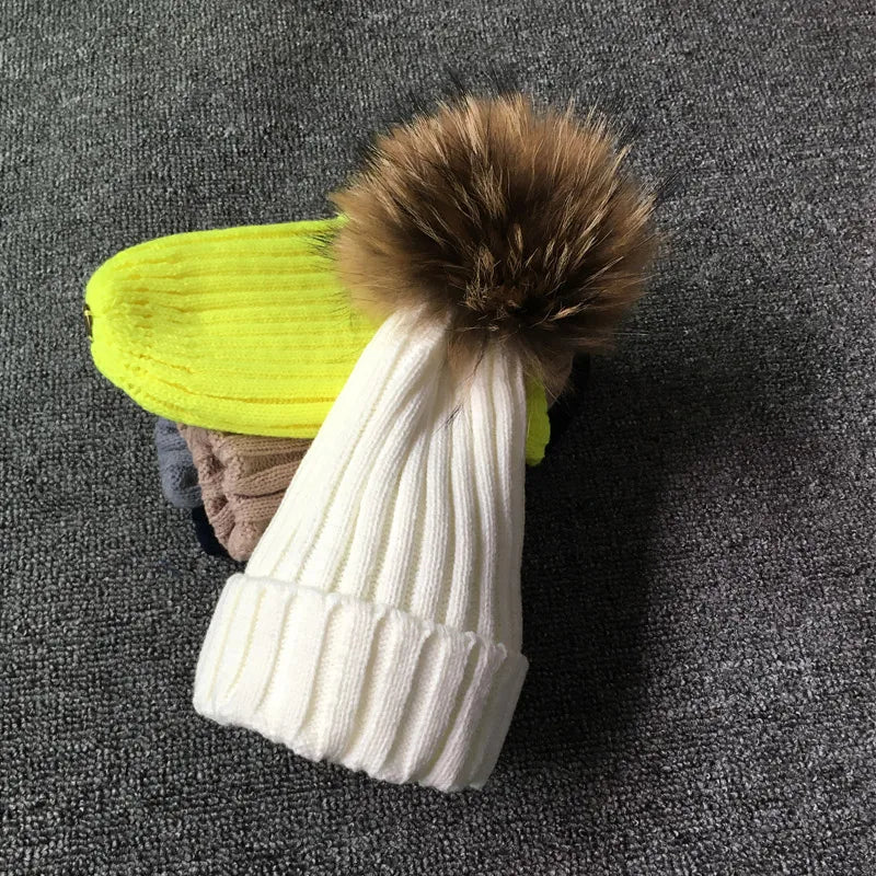 Stay warm and stylish: winter hat with fur pom pom - MAGNET MARKET